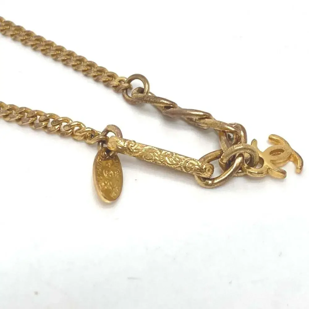 CHANEL Authentic Gold Logo Charm Bracelet